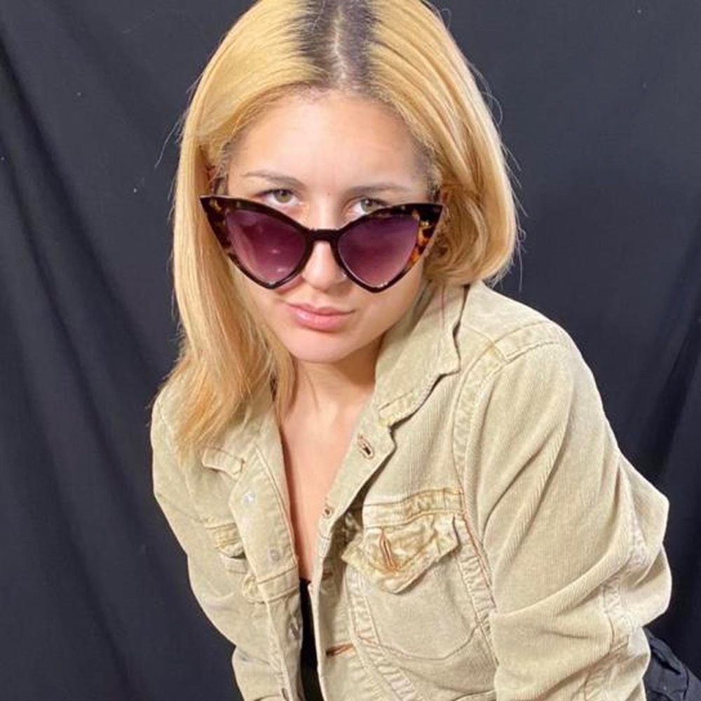 Black Marble Frames Miss Kitty, cat eye shaped sunglasses .